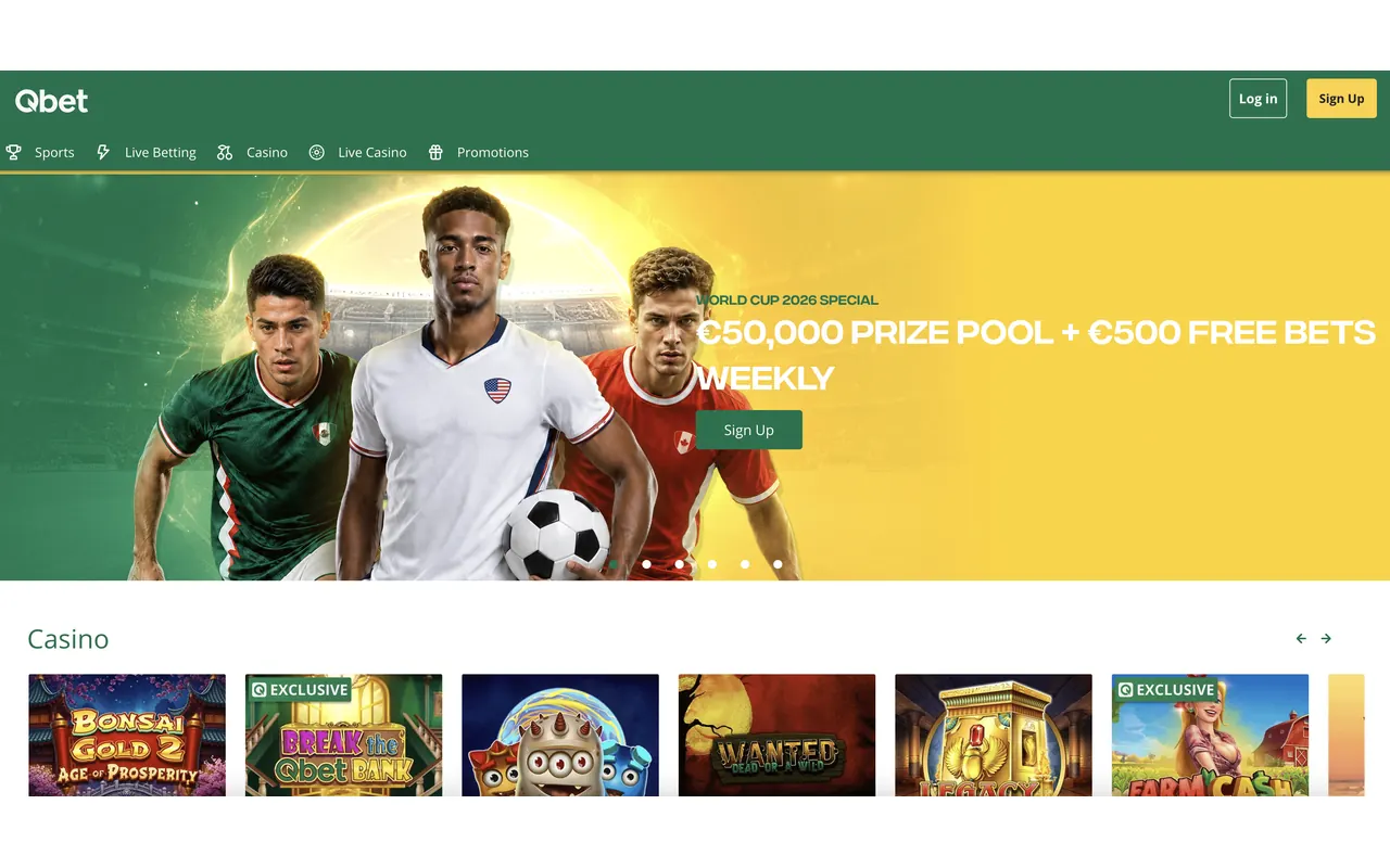 Qbet casino homepage screenshot showing the cashback banner and game lobby