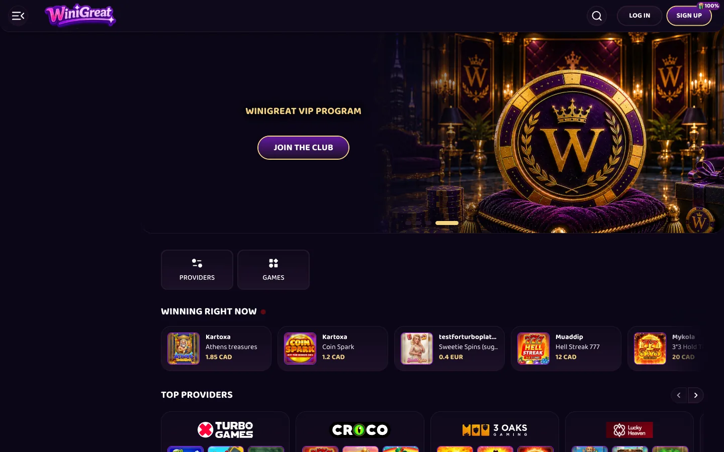 Winigreat, a new online casino licensed July 2026, real homepage screenshot showing the Fortune Wheels banner, live winners feed and top providers row